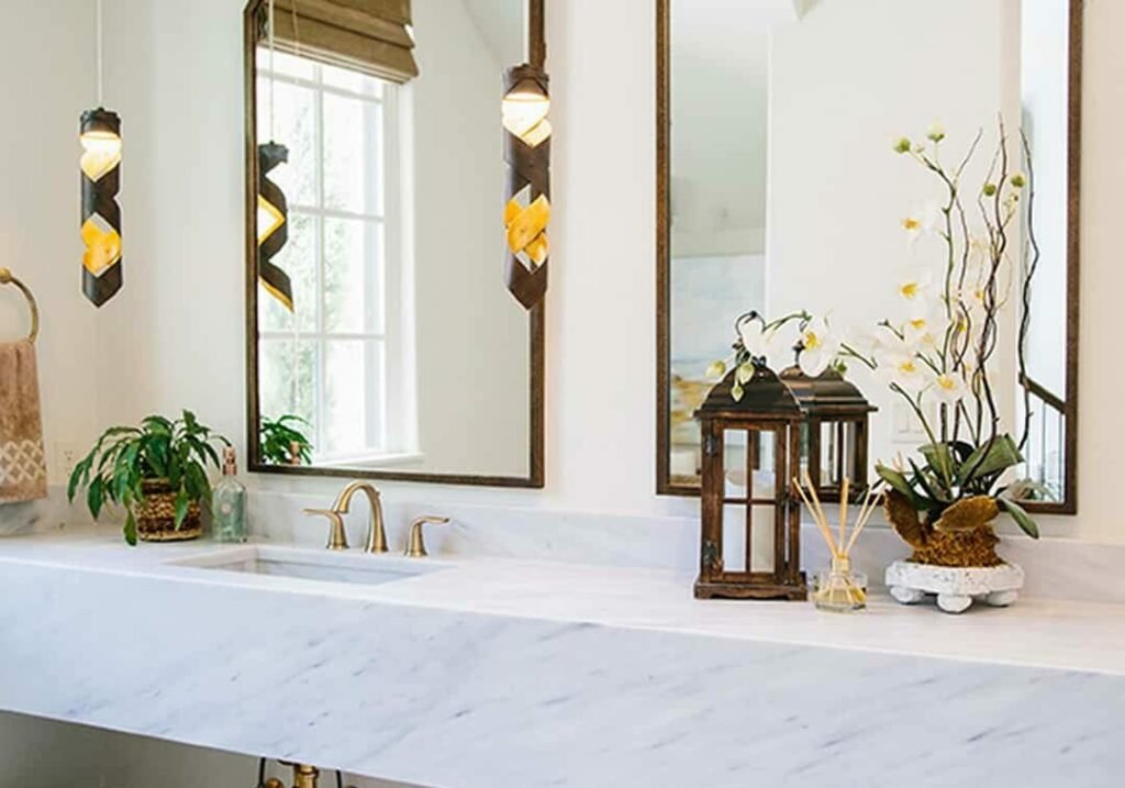 Farmhouse-bathroom-remodel-with-gold-fixtures-and-floating-sink-in-South-Miami-landscape